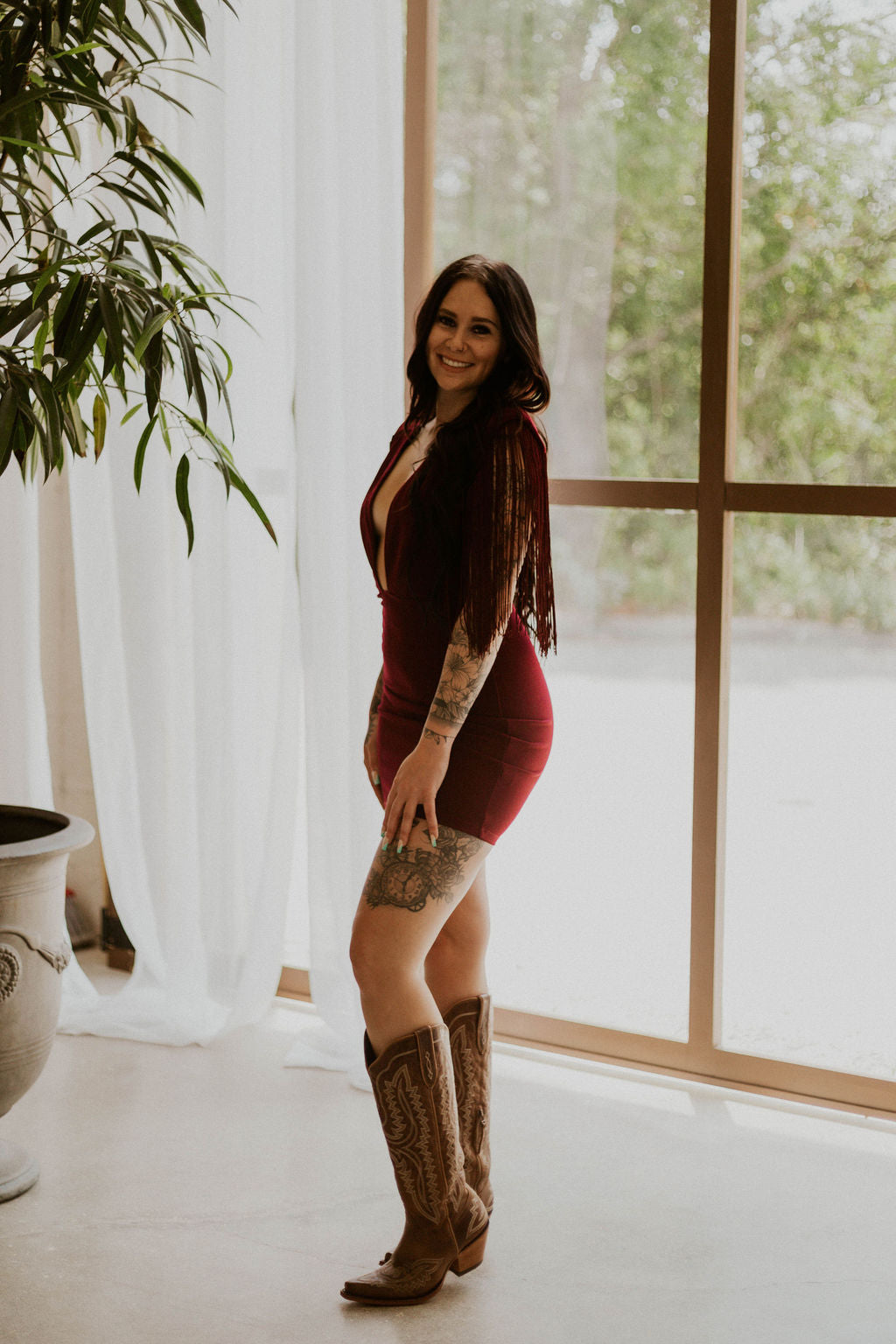 Dallas' Fringe Deep Neck Mini Dress