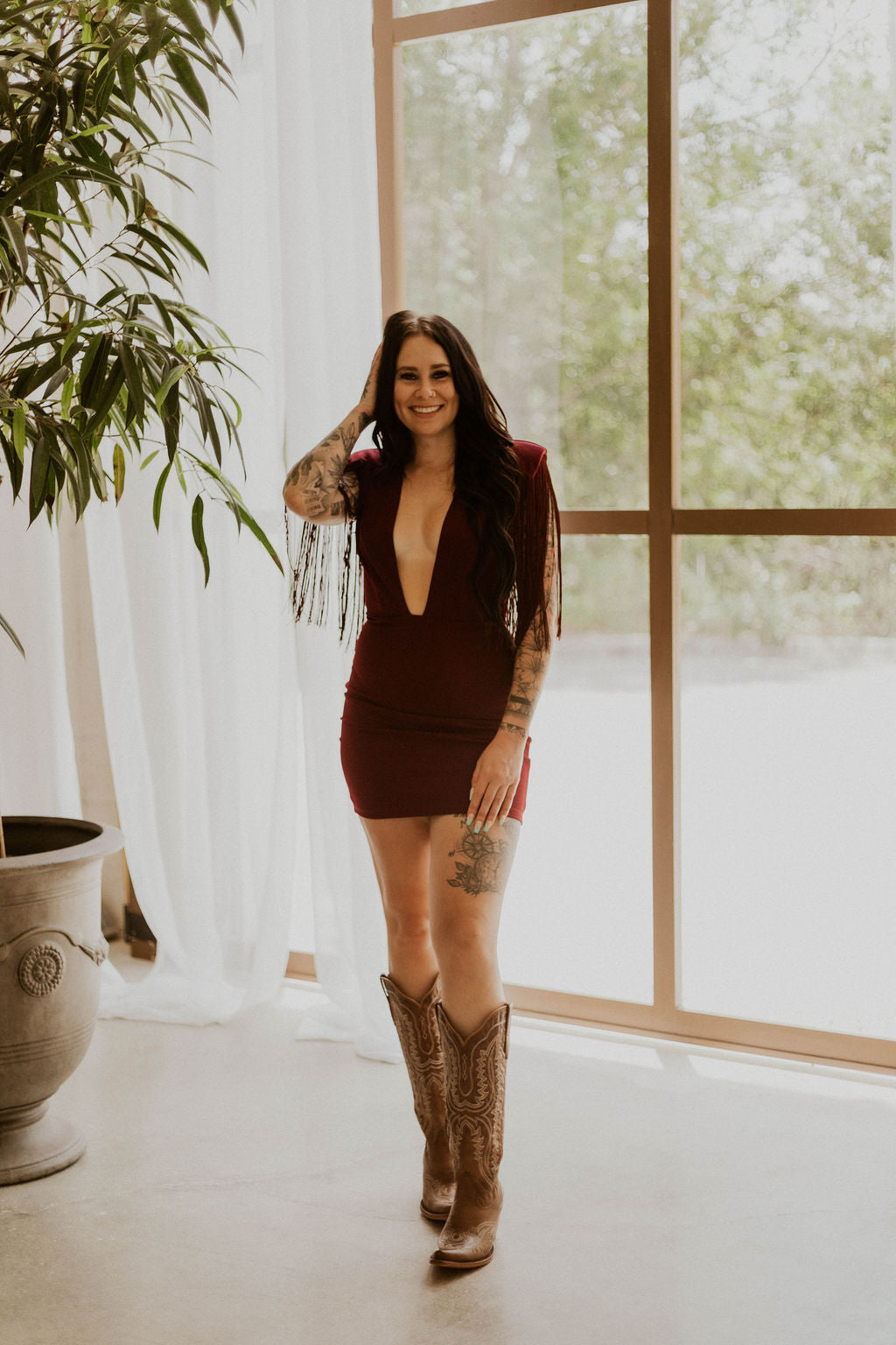 Dallas' Fringe Deep Neck Mini Dress